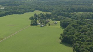 PP003_078 - HD stock footage aerial video of barns at the end of farm fields in Jackson, New Jersey