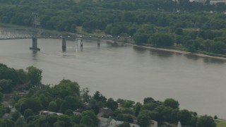 PP003_080 - HD stock footage aerial video of panning across a river to reveal the Burlington-Bristol Bridge, New Jersey