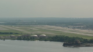 PP003_095 - HD stock footage aerial video of the Philadelphia International Airport in Pennsylvania, seen from the river