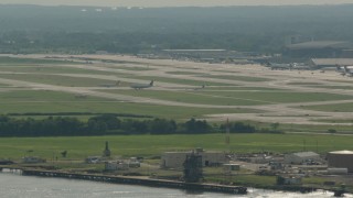 PP003_096 - HD stock footage aerial video of commercial planes at Philadelphia International Airport, Pennsylvania