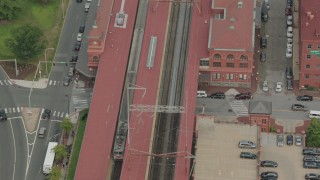 PP003_116 - HD stock footage aerial video of a commuter train stopping at the station in Wilmington, Delaware