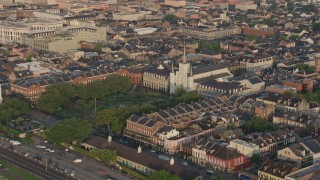 PVED01_032 - 4K aerial stock footage orbit St. Louis Cathedral and Jackson Square at sunrise, New Orleans, Louisiana