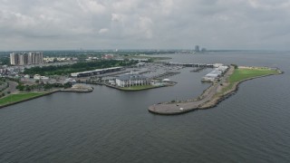 PVED01_095 - 4K aerial stock footage orbit marina and Breakwater Park on Lake Pontchartrain Shore in Lakeview, New Orleans, Louisiana