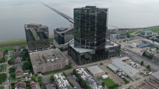 PVED01_101 - 4K aerial stock footage orbit Lakefront Hotel and office buildings in Metairie, New Orleans, Louisiana
