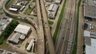 PVED01_111E - 4K aerial stock footage tilt from freeway interchange to reveal Superdome and Downtown New Orleans, Louisiana