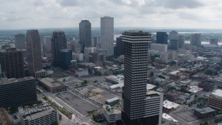 PVED01_112 - 4K aerial stock footage orbit Plaza Tower and Downtown New Orleans skyscrapers in Louisiana