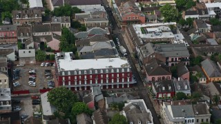 PVED01_118 - 4K aerial stock footage fly over French Quarter apartment building and street in New Orleans, Louisiana