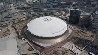 PVED01_121 - 4K aerial stock footage orbit of the Superdome in Downtown New Orleans, Louisiana