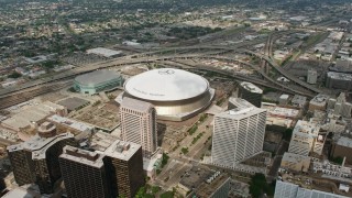 PVED01_123 - 4K aerial stock footage orbit the Superdome and New Orleans Arena in Downtown New Orleans, Louisiana