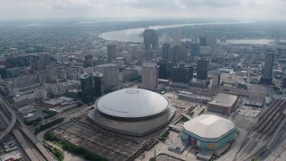 PVED01_126 - 4K aerial stock footage fly over Superdome and approach Downtown New Orleans skyscrapers, Louisiana