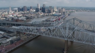 PVED01_133 - 4K aerial stock footage wide orbit of the Crescent City Connection and Downtown New Orleans, Louisiana