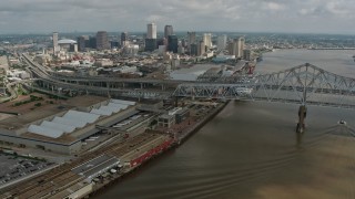 PVED01_133E - 4K aerial stock footage wide orbit of the Crescent City Connection and Downtown New Orleans, Louisiana