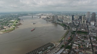 PVED01_142 - 4K aerial stock footage orbit the Mississippi River and Downtown New Orleans, seen from the French Quarter, Louisiana