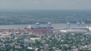 PVED01_146 - 4K aerial stock footage orbit cranes and containers at the Port of New Orleans in Louisiana