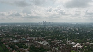 PVED01_153 - 4K aerial stock footage fly over Carrollton College and suburbs to approach Downtown New Orleans, Louisiana