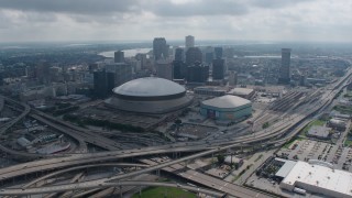 PVED01_157 - 4K stock footage aerial video approach the Superdome and Downtown New Orleans from the Garden District, Louisiana
