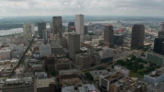 PVED01_159E - 4K aerial stock footage wide orbit of Downtown New Orleans, and reveal St. Louis Cathedral, Louisiana
