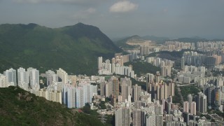 SS01_0003 - 5K stock footage aerial video pan across groups of apartment high-rises in Kowloon, Hong Kong, China