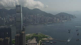 SS01_0004 - 5K stock footage aerial video approach International Commerce Centre in Kowloon and Hong Kong Island in China