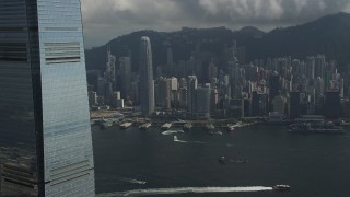 SS01_0006 - 5K stock footage aerial video pan across waterfront skyscrapers on Hong Kong Island in China