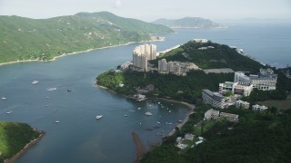 SS01_0060 - 5K stock footage aerial video approach apartment complexes overlooking harbor on Hong Kong Island, China