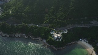 SS01_0072 - 5K stock footage aerial video fly over cove and coastal road on Hong Kong Island, China