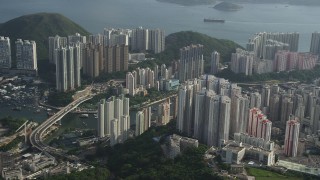 SS01_0079 - 5K stock footage aerial video approach waterfront apartment high-rises around harbor on Hong Kong Island, China