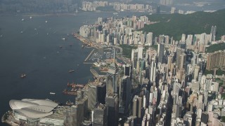 SS01_0085 - 5K stock footage aerial video of skyscrapers on the shore of Victoria Harbor on Hong Kong Island, China