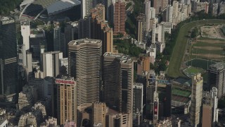 SS01_0100 - 5K stock footage aerial video reverse view of Times Square Towers and reveal race track on Hong Kong Island, China