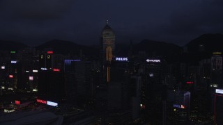 SS01_0134 - 5K stock footage aerial video approach Central Plaza and high-rises on Hong Kong Island at night, China