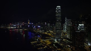 SS01_0185 - 5K stock footage aerial video of International Finance Centre and skyscrapers on Hong Kong Island at night, China