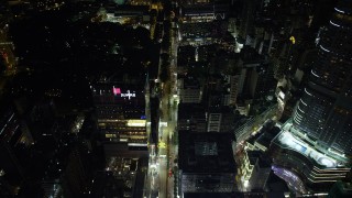 SS01_0192 - 5K stock footage aerial video fly over Nathan Road through Kowloon at night in Hong Kong, China