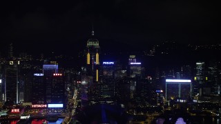 SS01_0204 - 5K stock footage aerial video approach Central Plaza and neighboring high-rises at night on Hong Kong Island, China