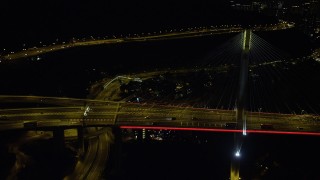 SS01_0248 - 5K stock footage aerial video flyby light traffic on the Ting Kau Bridge at night in Hong Kong, China