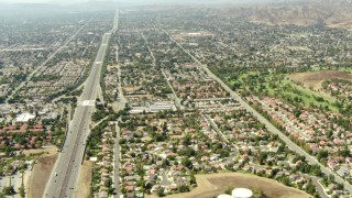 TS01_004 - 1080 stock footage aerial video tilt from 118 freeway to wide view of Simi Valley, California