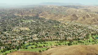 TS01_005 - 1080 stock footage aerial video fly over golf course and homes in Simi Valley, California