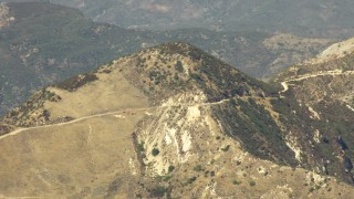 TS01_017 - 1080 stock footage aerial video of a mountain summit and road in Los Padres National Forest, California