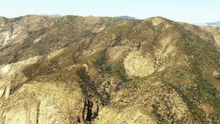 TS01_026 - 1080 stock footage aerial video tilt to a view of a mountain ridge summit in Los Padres National Forest, California
