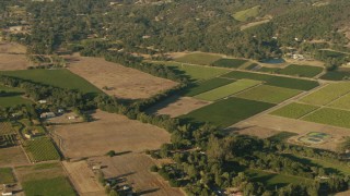 TS01_174 - 1080 stock footage aerial video of farmland and rural homes in Sonoma, California