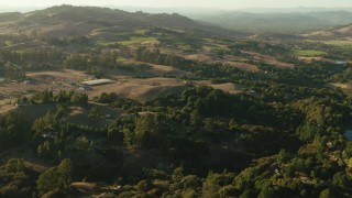 TS01_191 - 1080 stock footage aerial video fly over homes and farms in Bennett Valley, California