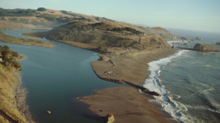 TS01_210 - 1080 stock footage aerial video of flying by Goat Rock Beach on the California Coast