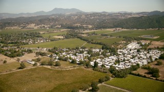 TS01_225 - 1080 stock footage aerial video of approaching fields and mobile home park in Santa Rosa, California