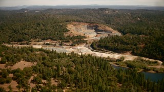 TS01_280 - 1080 stock footage aerial video of approaching a quarry in Meadow Vista, California