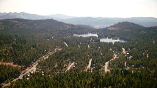 TS01_299 - 1080 stock footage aerial video flyby homes and trees by Serene Lakes, Soda Springs, California