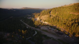 TS01_311 - 1080 stock footage aerial video of flying over Donner Pass Road and shops in Norden, California