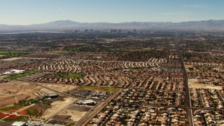 TS02_31 - 1080 stock footage aerial video pan across homes in East Las Vegas to reveal the Las Vegas Strip, Nevada
