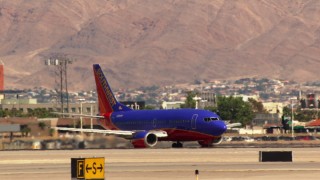 TS02_48 - 1080 stock footage aerial video of a Southwest airliner at McCarran International Airport, Las Vegas, Nevada