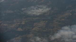 WA001_016 - 4K stock footage aerial video of a bird's eye view of clouds over mountains and suburbs in Santa Clarita Valley, California