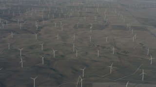 WA001_051 - 4K stock footage aerial video flyby a field of windmills in Solano County, California