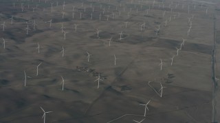 WA001_052 - 4K stock footage aerial video of passing a field of windmills in Solano County, California